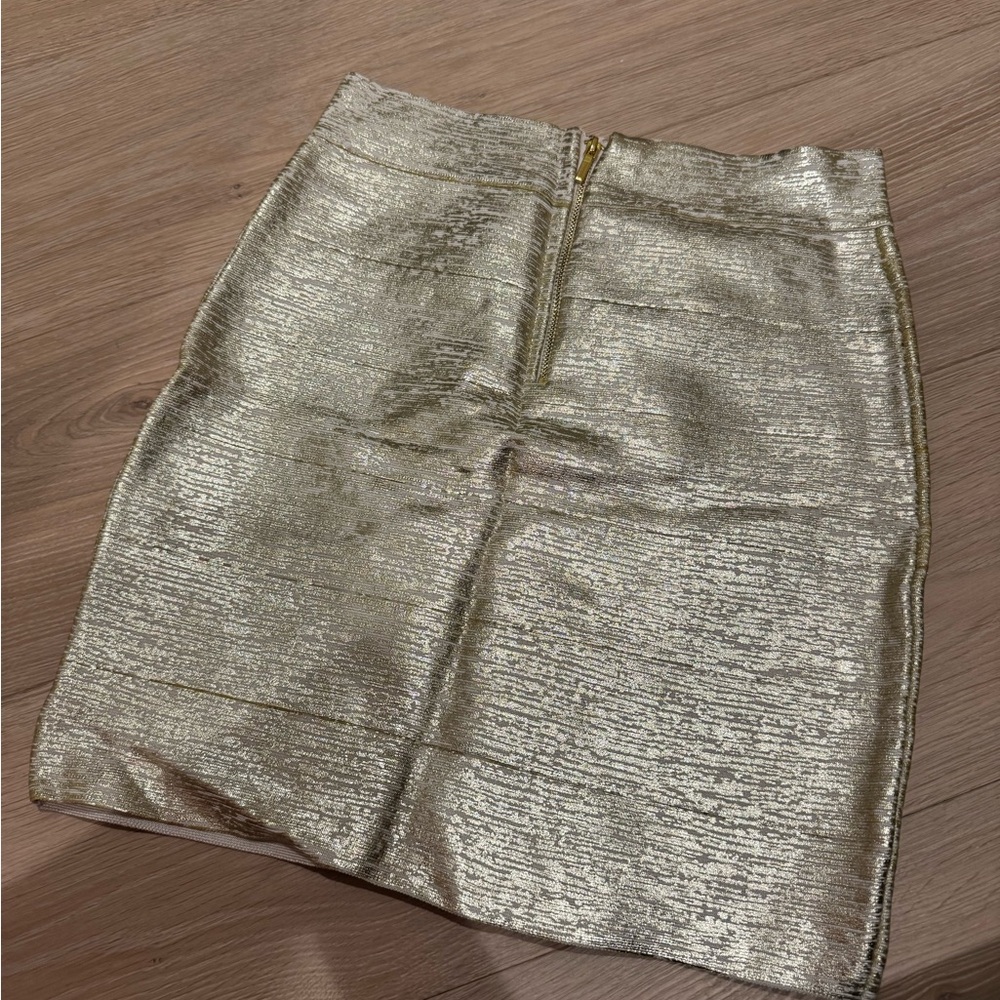 PERFECT FOR NYE! Bebe Gold detailed bandage skirt
